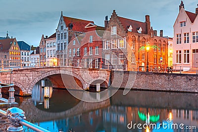 Night Bruges canal and bridge, Belgium Stock Photo