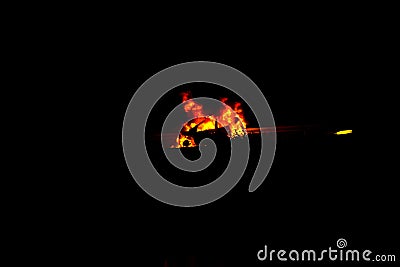 Night. Burning cars, unrest, anti-government. Consequences of the collision, crime. Car on fire isolated Stock Photo