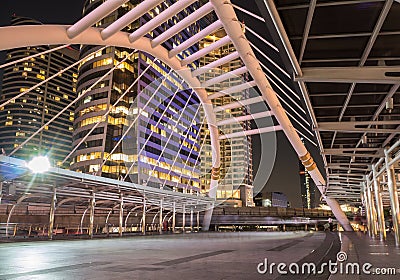 Night city of bridge with sky walk background.Chong Nonsi BTS St Stock Photo