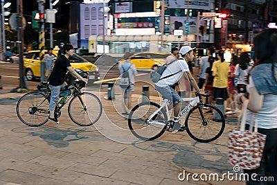 Night cyclists ride their beautiful bikes Editorial Stock Photo