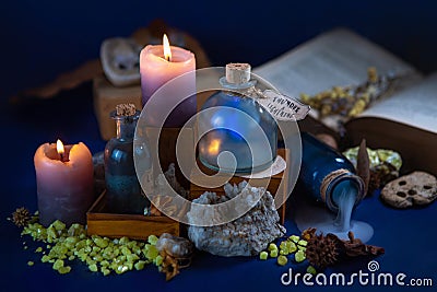 Night fabulous still life. Lab wizard. Flasks, candles, crystals, smoke, magic. Chemical experiments. Illustration for a fairy Stock Photo