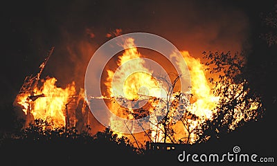 Night house fire close up insurance case Stock Photo