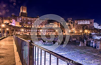 Night illuminated view of Imperial Fora (Fori Imperiali) urban scene in Rome Editorial Stock Photo