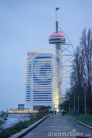 Night image of the exterior of Myriad Hotel in Parque das NaÃ§Ãµes in Lisbon. Editorial Stock Photo