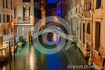 Night lateral canal and bridge in Venice, Italy Stock Photo