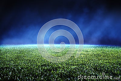 Night low view of maintained lawn at football stadium. Stock Photo