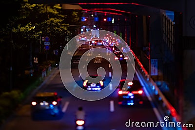 A night miniature traffic jam at the city street in Tokyo Editorial Stock Photo