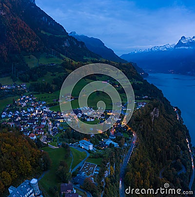 Night panorama of the canton Schwyz, Lake Lucerne. City Morschach. Night lights. Aerial view Stock Photo
