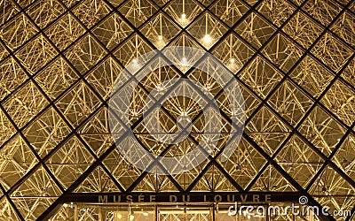 Night panorama of Louvre pyramid glass design architecture museum building construction in Paris France Europe Editorial Stock Photo