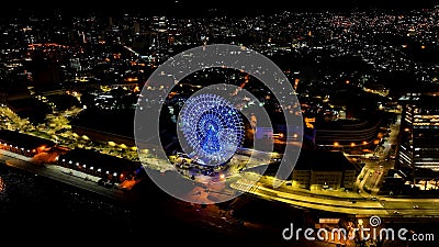 Night panoramic landscape of illuminated ferris wheel at Rio de Janeiro Brazil Editorial Stock Photo