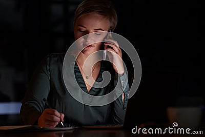 Night, phone call and woman writing, planning and working on project, confirm deadline and schedule. Dark, female Stock Photo