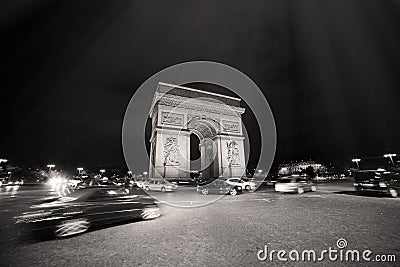 Night Photo of the Arch of Triumph in Paris Stock Photo