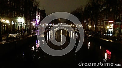 Night photo of the river in Amsterdam, Netherlands Editorial Stock Photo