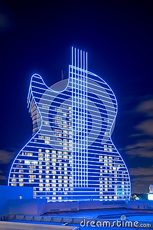 Night photo of the Seminole Hard Rock guitar as seen from the parking garage Editorial Stock Photo