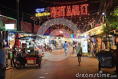 SIEM REAP, CAMBODIA - 29TH MARCH 2017: Bars, restaurants and lights along Pub Street in Siem Reap Cambodia at night Editorial Stock Photo