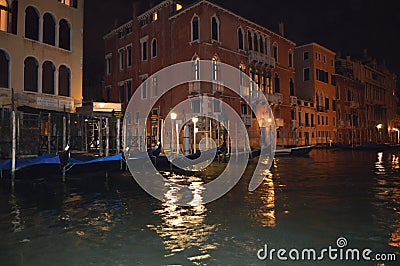 Night Photograph Of A Full Jetty Of Gondolas On The Grand Canal Of Venice From The Adriatic Sea. Travel, Holidays, Architecture. Editorial Stock Photo