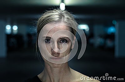 Night portrait of an attractive intense woman Stock Photo