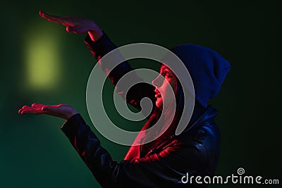 Night portrait female energy magic trick woman Stock Photo