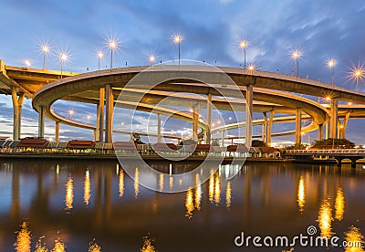 Night round about highway intersection Stock Photo