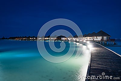 Night scene of typical luxury overwater villa Stock Photo