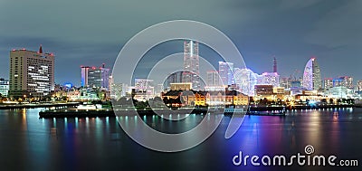 Night scenery of beautiful Yokohama Minatomirai Seaport with view of high rise skyscrapers Stock Photo