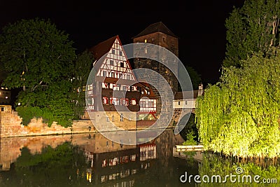 Night scenery- river Pegnitz, old bridge, old town - Nuremberg, Germany Stock Photo