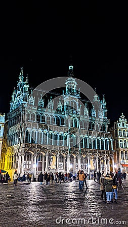 Night shot of illuminated facades on the Grand Place or Square also used in English or Grote Markt or Grand Market that is the Editorial Stock Photo