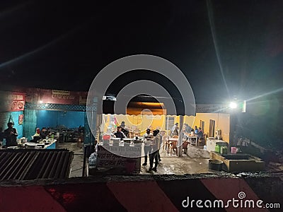 night shot of road side business, small eateries on a highway in Jammu Stock Photo