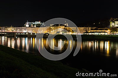 Cityscape Skyline of Salzburg with a view of the fortress Hohensalzburg at night Stock Photo