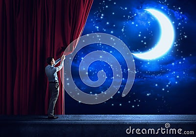 Night sky behind curtain Stock Photo