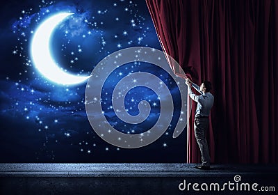 Night sky behind curtain Stock Photo