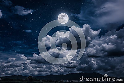 Night sky with bright full moon and dark cloud, serenity nature Stock Photo