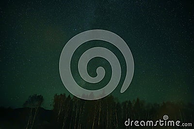 Night sky over rural landscape Stock Photo