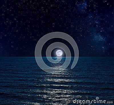 Night sky over sea with full moon Stock Photo