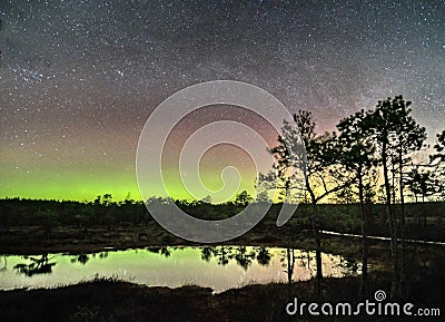 Night sky stars and Aurora polar lights Stock Photo