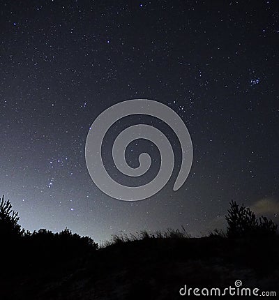 Night sky stars Orion and Taurus constellations observing Stock Photo