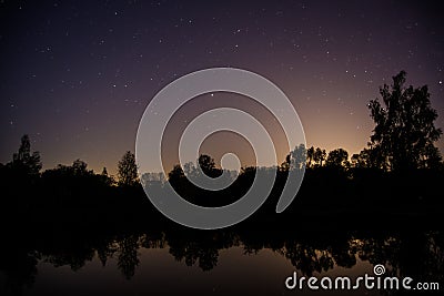 Night sky with town glow Stock Photo