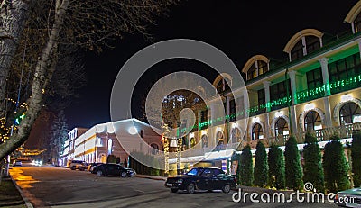 Night street with cars and mansions Stock Photo