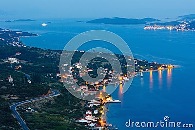 Night summer coastline and village on seashore (PeljeÅ¡ac peni Stock Photo