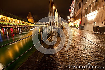 Night time scene of Lucerne along river Stock Photo