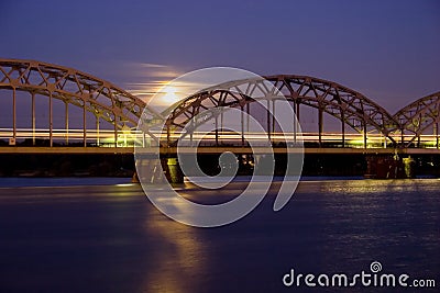 Night Train on Iron Bridge Stock Photo