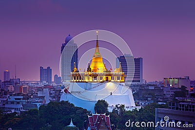 Night Urban City Skyline, Saket Temple (Golden mountain), Landmark of Bangkok, Thailand. Stock Photo