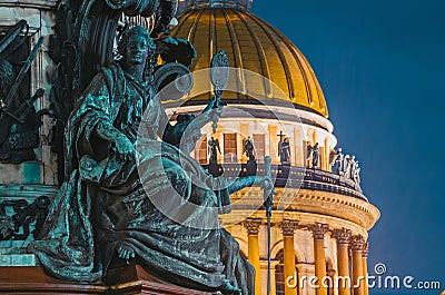 Night view of the ancient statues of stucco and the dome of St. Isaac`s Cathedral Saint-Petersburg. Stock Photo