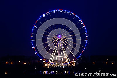 Night view of big wheel in Paris Editorial Stock Photo