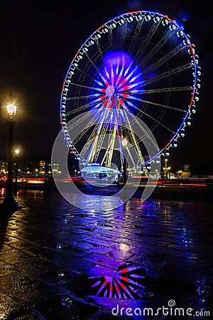 Night view of big wheel in Paris Editorial Stock Photo