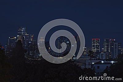 Night view of the city life. The light of the buildings shone with cool blue tones. View of night scene of Tel Aviv Editorial Stock Photo