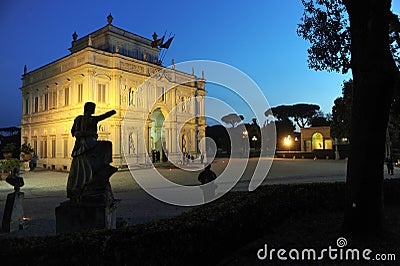 Night view at dusk of the Algardi cottage inside the public park of Villa Pamphili in Rome, Italy Stock Photo