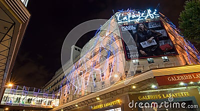 Night view of the facade of the famous Lafayette galeries Editorial Stock Photo