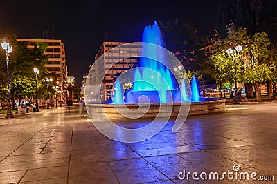 Night view of the fountain in the middle of Syntagma square Athens. Editorial Stock Photo