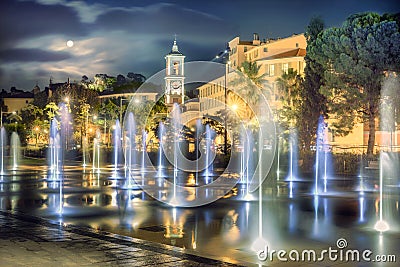 Beautiful fountain on Place Massena in Nice at night time. France Stock Photo